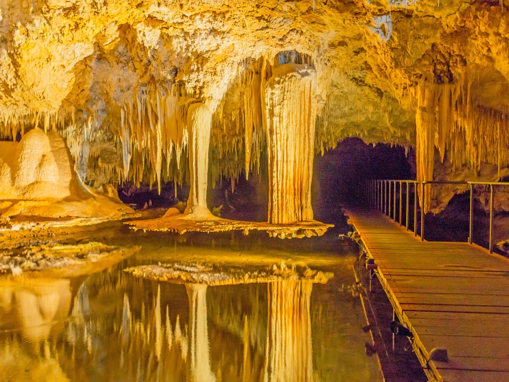 Lake Cave, near the town of Margaret River in Western Australia, with its beautiful 'suspended table', stalactites and crystal formations