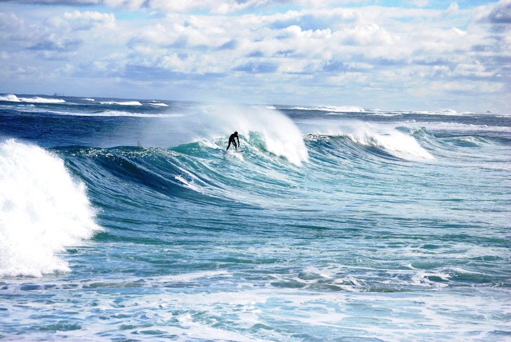 surfer riding the waves in Margaret River