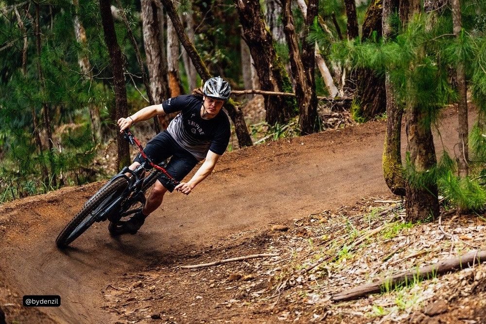 Mountain biker riding on Huff n Puff The Pines